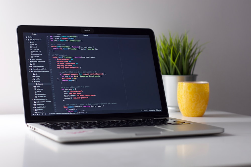 Developer workstation with code on screen in a modern workspace